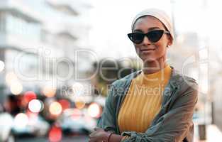 Spending my weekend the right way. an attractive young woman wearing a hijab and sunglasses while touring the city.