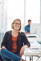 Confident and smiling businesswoman, executive or corporate leader with success, leadership and confidence in a work office. Face portrait of a smart creative research analyst, manager or boss