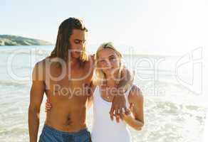 He knows just how to make me happy. a young couple enjoying some quality time together at the beach.