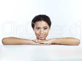 I think Im just going to hang here. Portrait of an attractive young woman posing against a white background.