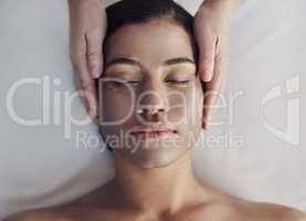 Glowing skin needs lot of nourishment. a young woman getting a facial treatment at a spa.