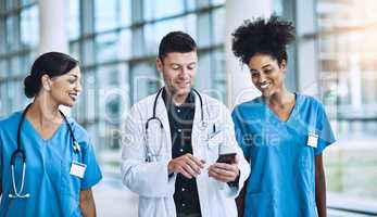 Theyll always come up with whats best for you. medical practitioners having a conversation in a hospital.