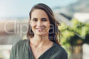 Beautiful days outside with a beautiful soul. Portrait of a cheerful young woman relaxing outdoors.