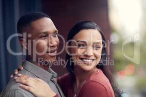 Fill the world with lots of love. a happy young couple sharing a romantic moment together.