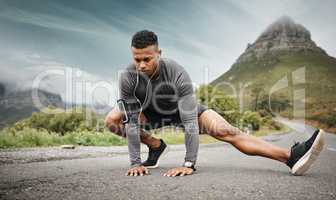 Determination earns results. a sporty young man exercising outdoors.