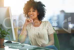 Friendly and successful business woman or corporate professional happy with her job in Human Resources department at a modern company. Portrait of a young administrator or HR intern in an office