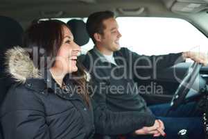 We enjoy our Sunday road trips. a happy young couple out on a road trip.