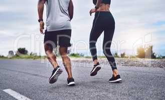 Run towards the healthy lifestyle you want to lead. Closeup shot of a sporty couple exercising together outdoors.