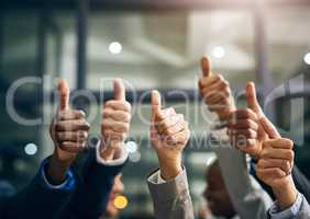 Hands showing thumbs up with business men endorsing, giving approval or saying thank you as a team in the office. Closeup of corporate professionals hand gesturing in the positive or affirmative