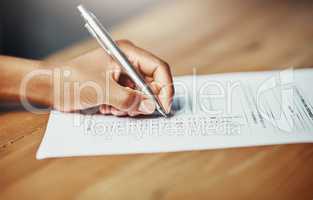 Her opinion matters. Closeup of a female hand filing in paperwork for a formal application or survey. A woman writing on a form applying for a financial loan, completing a list or questionnaire.