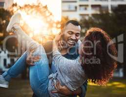 Time for a little sun and a whole lot of fun. a young couple having fun together outdoors.