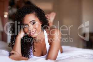 Sensuality personified. Portrait of a gorgeous young woman posing seductively in her bedroom.