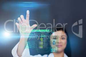 Access to all the latest medical advancements. an attractive young female nurse using a touchscreen interface while standing against a black background.