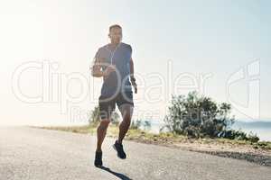 Get moving and start losing weight. a handsome young man running outdoors.