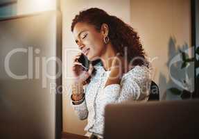 That call that goes on way longer than it should. a young businesswoman experiencing tension during a late night at work.