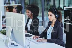 Let me review the issue and get back to you soonest. young women working in a call centre.