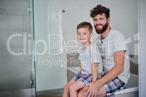 Time to get fresh and ready for the day. Portrait of a father and his little son getting ready in the bathroom at home.