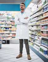 The chief pharmacist. a confident mature pharmacist working in a pharmacy.