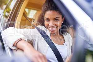 Need a ride. Cropped portrait of an attractive young businesswoman driving to work on her morning commute.