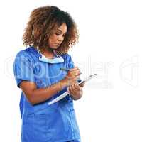 Noting down ways to keep you at your healthiest. Studio shot of an attractive young nurse writing on a clipboard against a white background.