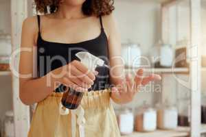 Hygiene, female spraying sanitizer on hands and helping to prevent the spread of disease by cleaning. Caucasian woman sanitizing, health and disinfecting with alcohol to clean and remove germs.