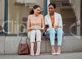 Businesswomen on a break using phone outdoors with workers browsing social media, looking at text or chat. Young, female and professional entrepreneurs outside discussing work on mobile together.