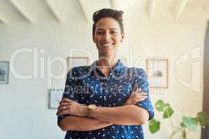 Confident in my ability to design your dreams. Cropped portrait of an attractive young female designer standing with her arms folded in the office.