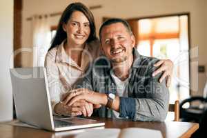 The best partner to plan with. a married couple planning their financial budget at home.