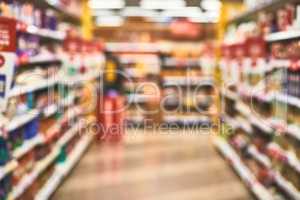 Open for your shopping convenience. an empty grocery store.