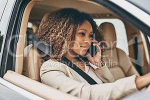 Communicating with clients while on the commute. an attractive businesswoman on a call during her morning commute.