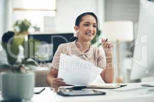 Finance manager, businesswoman or financial analyst budgets on a computer with paperwork. Young smiling accountant, insurance advisor or investment planner working on tax, bills or accounting papers