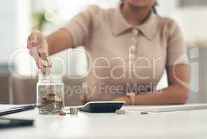 Finance, planning and saving jar for investment or micro loan. Closeup of Accountant, businesswoman or bank advisor sitting at desk. Financial growth for future plans or career change.
