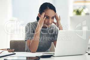 Confused, stressed and anxious businesswoman with laptop suffering from a headache, pressure and agency deadline. Creative entrepreneur thinking of solution, making mistake and trying to understand