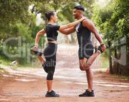 Fitness, active and healthy couple stretching, exercising or training together outside park. Sporty and supportive man and woman preparing for workout exercise, warmup routine or jogging in nature