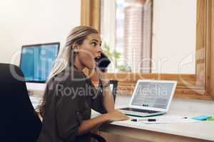 Surprised, shocked and excited young businesswoman gossiping and listening to fake news on a phone call in the office. Amazed female gasping wow in disbelief with an oh my god expression on her face