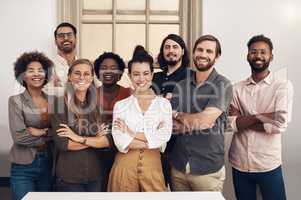 Happy, diverse and smiling startup entrepreneurs standing together showing teamwork goals. Contact us and learn about us and our vision, mission and faq from our international business community