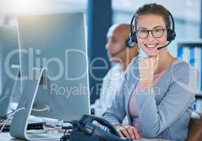 Call center agent, telemarketing employee or customer service worker is happy and smiling in the office. Portrait of a caucasian female sales representative ready and excited to help and answer calls