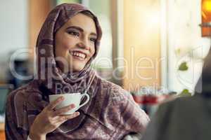 Best friends make the perfect coffee companions. a young woman having a coffee with her friend in a cafe.