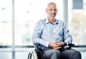 Theres no excuse not to live with a purpose. Portrait of a mature man sitting in a wheelchair.