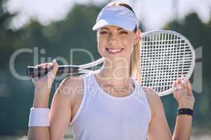 Professional tennis player, fit athlete and active woman playing sport, match and game with racket outdoors. Portrait of smiling, healthy and excited female ready to serve, hit and and play hobby