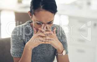 Work stress, bad anxiety and job worry of a stressed female office worker with a headache. Business woman worried, tired and upset about a finance deadline with a migraine at the workplace
