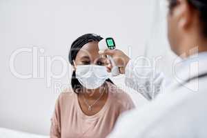 Doctor taking temperature of a covid patient while testing for high fever symptoms of sick, flu or illness. Screening woman for a healthcare consult, checkup and visit in a hospital or medical clinic