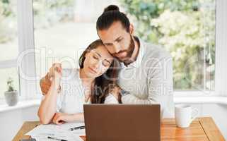 Support, couple and finances while embracing each other and sitting with papers and a laptop for bill payments and looking worried in a tough economy. Husband and wife having financial difficulties