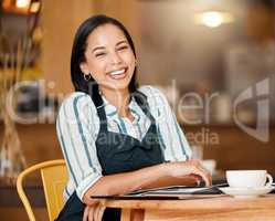 Coffee shop owner looking proud and happy while doing paperwork and having coffee break. Young business woman checking stock, orders and inventory, enjoying her career. Positive lady managing a cafe