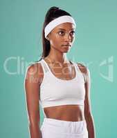 Black female tennis, badminton or squash player standing, relax and cool before competition, tournament and game or match. Athletic and fit African American sports woman with professional sportswear