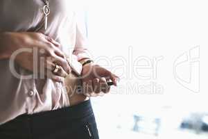 Managing her general health. Closeup shot of an unidentifiable businesswoman injecting her stomach.