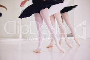 Ballet dance, dancing or performing girls during practice rehearsal in studio with low angle legs sequence. Group of ballerina dancers or artist in tutu costume with shoes practicing art performance