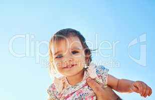 Soar high little one. an adorable little girl outdoors.