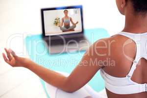 Streaming on laptop for yoga, meditation and zen tutorial, class and webinar in home lockdown or quarantine. Relaxed, healthy or calm woman meditating for balance, holistic breathing or mental health