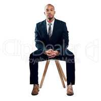 When it comes to business, always dress to impress. Studio shot of a handsome young businessman posing against a white background.